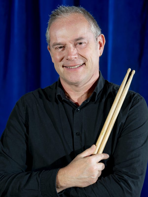 Chef d'orchestre et batteur